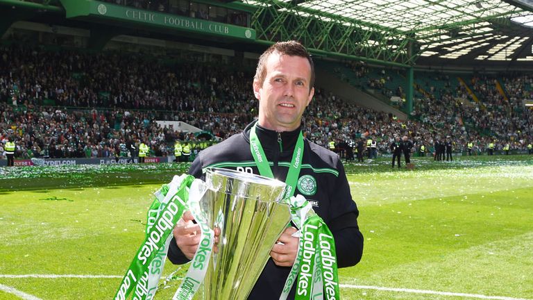 Ronny Deila paraded the Scottish Premiership trophy for the second time on Sunday