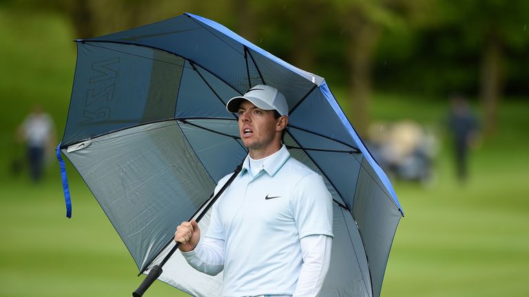 STRAFFAN, IRELAND - MAY 21:  Rory McIlroy of Northern Ireland stands under an umbrella on the 4th hole during the third round of the Dubai Duty Free Irish 