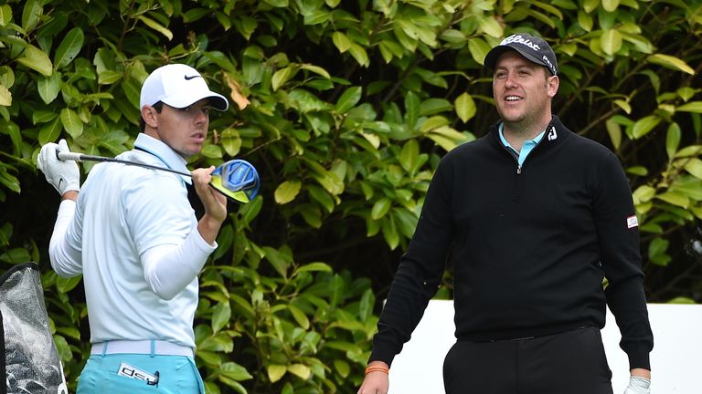 STRAFFAN, IRELAND - MAY 21:  Rory McIlroy of Northern Ireland and Matthew Southgate of England wait on the 4th tee during the third round of the Dubai Duty