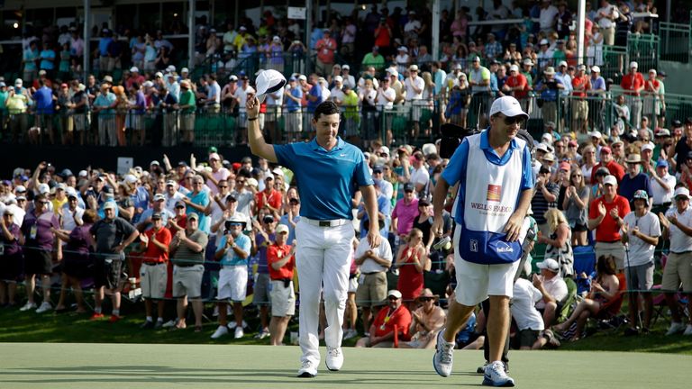 CHARLOTTE, NC - MAY 17: Rory McIlroy of Northern Ireland reacts after putting in to win on the 18th hole during the final round at the Wells Fargo Champion