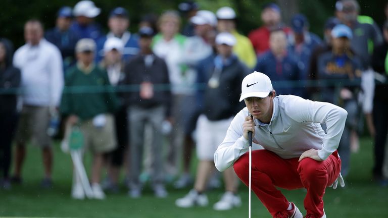 Rory McIlroy of Northern Ireland lines up a putt on the tenth green during the first round of the Wells Fargo Championship at Quail Hollow