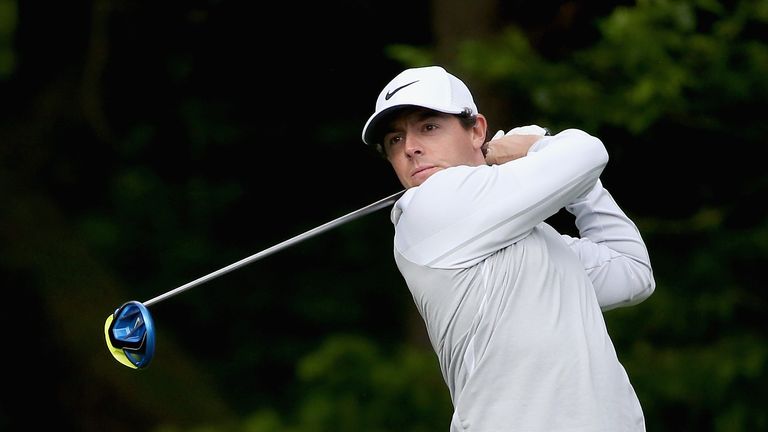 Rory McIlroy watches a tee shot on the 12th hole during the first round of the 2016 Wells Fargo Championship at Quail Hollow Club 