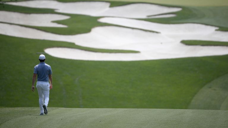 Rory McIlroy walks down the fifth fairway during the third round of the 2016 Wells Fargo Championship at Quail Hollow Club on May 