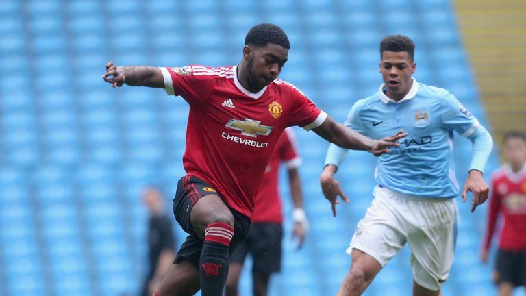 RoShaun Williams in action for Manchester United's Under-21 side against Ashley Smith-Brown of Manchester City in February 2016