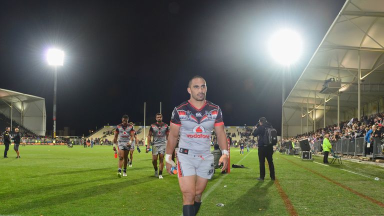 Thomas Leuluai of the Warriors and his teammates look dejected after their defeat in the round 10 NRL match against the Panthers