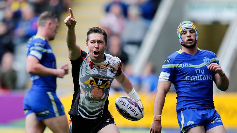 Luke Dorn celebrates scoring a try against Warrington at Magic Weekend