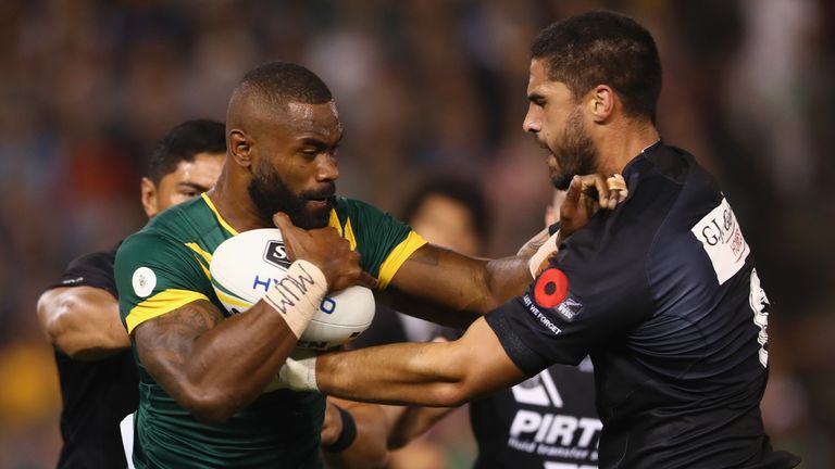 Australia's Fiji-born wing Semi Radradra is tackled by New Zealand's Jesse Bromwich