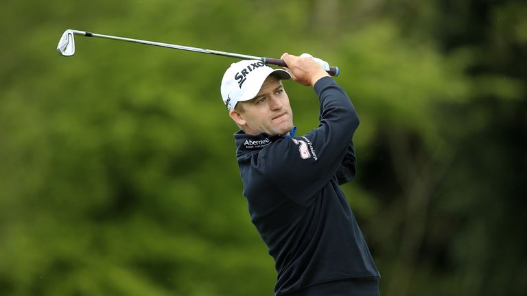 Russell Knox of Scotland hits his 2nd shot on the 13th hole during the final round of the Dubai Duty Free Irish Open