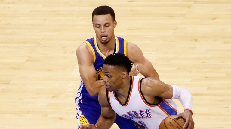 Russell Westbrook #0 of the Oklahoma City Thunder drives against Stephen Curry #30 of the Golden State Warriors in game three 