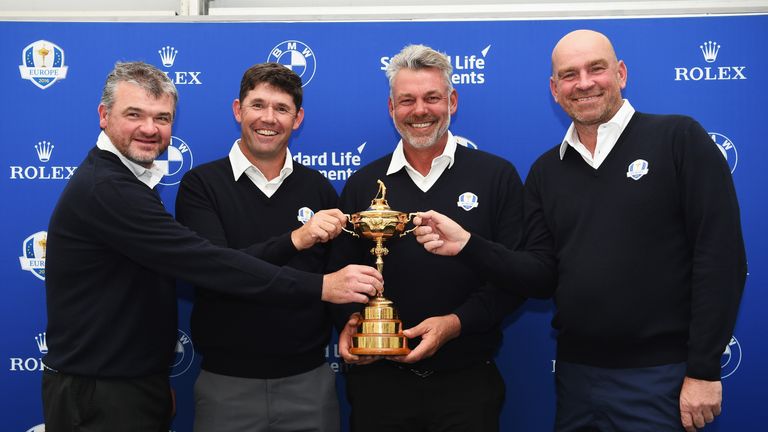 VIRGINIA WATER, ENGLAND - MAY 27:  Ryder Cup Captain Darren Clarke (2ndR) of Northern Ireland poses with the Ryder Cup and his vice-captains Paul Lawrie (L