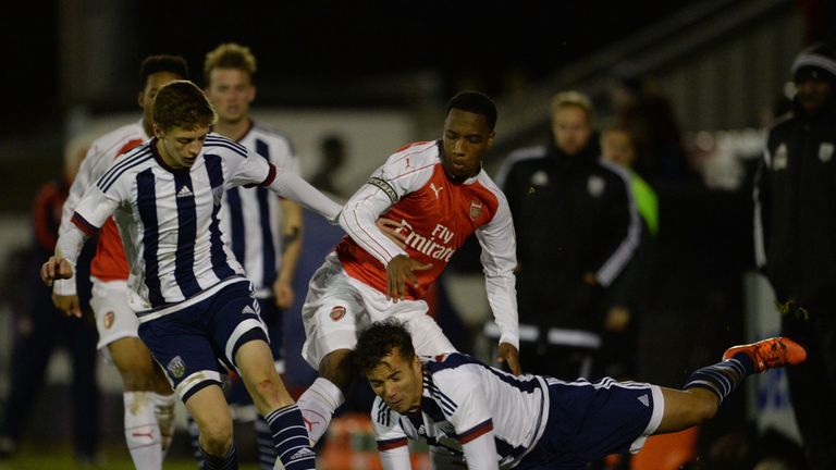 Kaylen Hinds of Arsenal U18s battles for the ball with Sam Field and Kane Wilson of West Bromwich U18s in the FA Youth Cup on December 4, 2015.