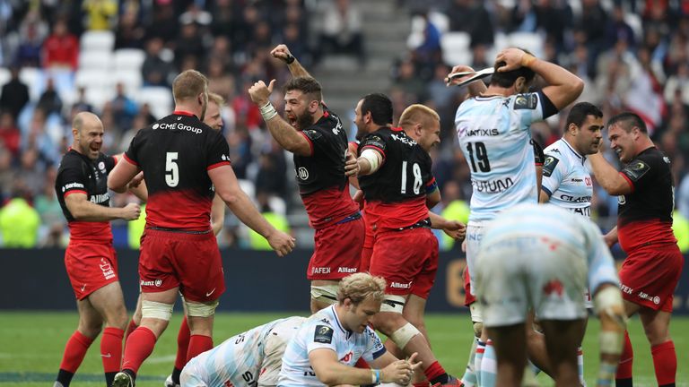 Saracens players celebrate after winning the Champions Cup Final