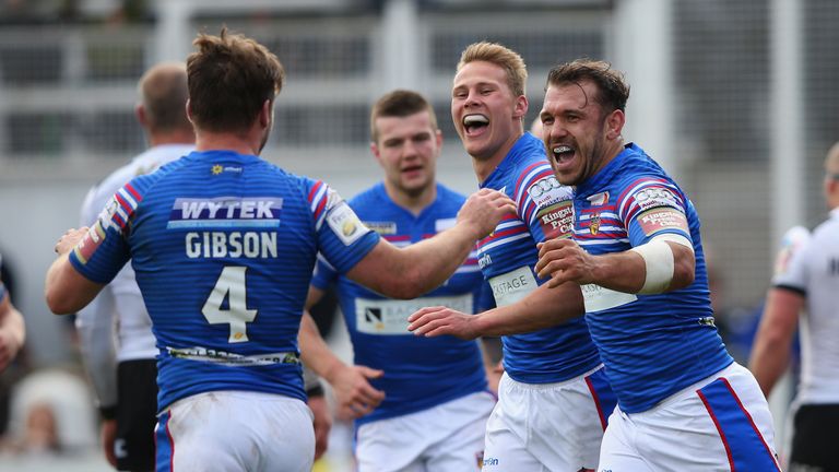 Scott Moore (far right) has been charged with gouging