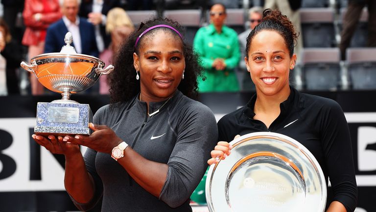 Serena Williams and Madison Keys display their trophies after the Italian Open final