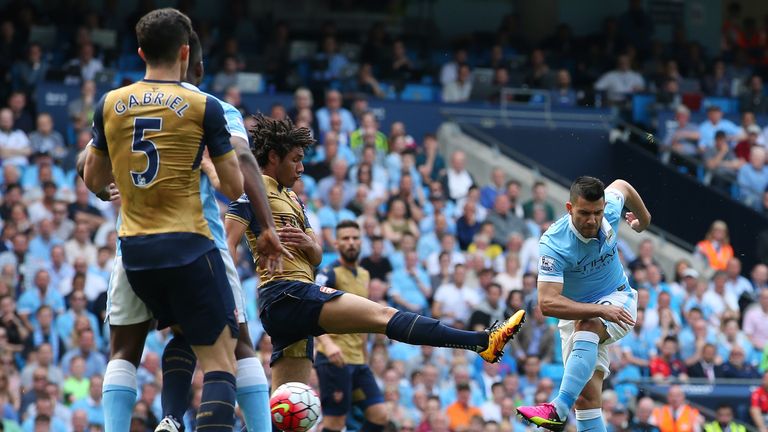 Sergio Aguero of Manchester City scores his side's first goal during the Barclays Premier League match between Manchester Ci
