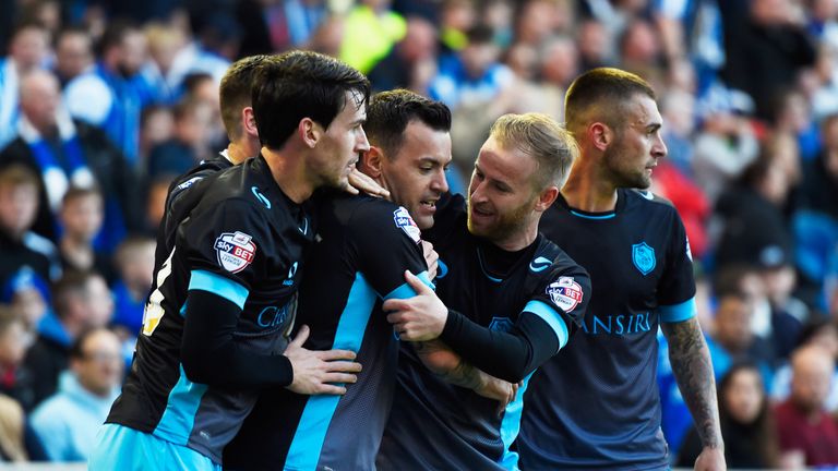 Ross Wallace of Sheffield Wednesday (c) celebrates with team mates as he scores their first and equalising goal.
