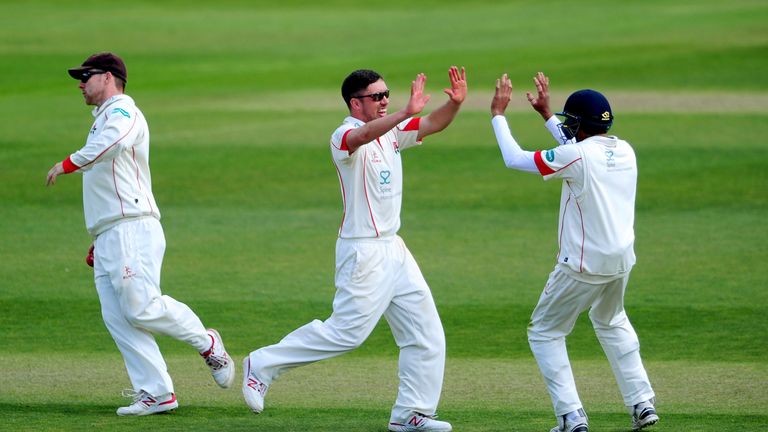 Simon Kerrigan of Lancashire celebrates after dismissing Tom Abell of Somerset during Day Three of the Specsavers County 