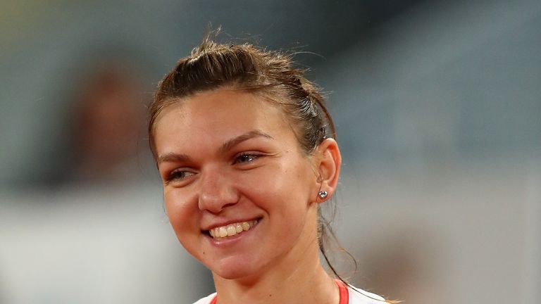 MADRID, SPAIN - MAY 06:  Simona Halep of Romania celebrates defeating Sam Stosur of Australia in the semi finals during day seven of the Mutua Madrid Open 