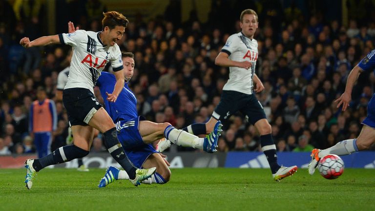 Tottenham Hotspur's South Korean striker Son Heung-Min (L) scores their second goal during