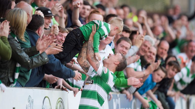 Celtic's Leigh Griffiths celebrates scoring his 40th goal of the season with his son