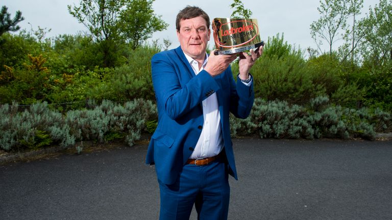 St Johnstone manager Tommy Wright is awarded the Ladbrokes Manager of the Season trophy