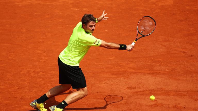 Stan Wawrinka of Switzerland plays a backhand during the Men's Singles second round match against Taro Daniel of Japan at French Open