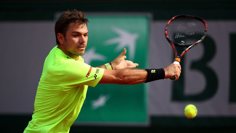 Stan Wawrinka hits a backhand during the French Open Men's Singles third round match against Jeremy Chardy
