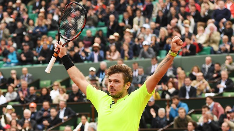 Stan Wawrinka celebrates his first-round win at the 2016 French Open