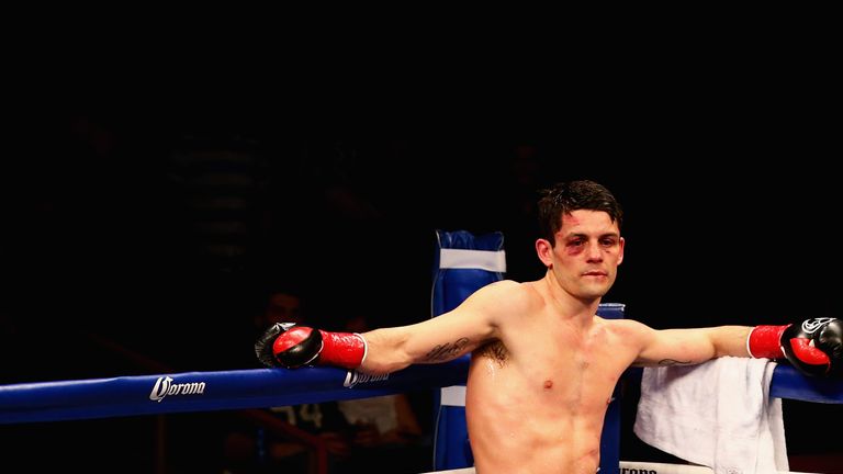 Stephen Smith reacts after being defeated by Jose Pedraza in their IBF World Junior Lightweight Championship bout at Foxwoods 