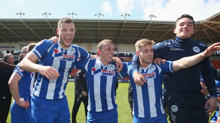 Stephen Warnock (C) won promotion with Wigan on loan from Derby