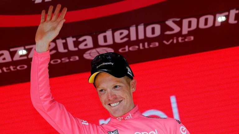 Dutchman Steven Kruijswijk of team Lotto NL celebrates the pink jersey of the overall leader on the podium of the 14th stage of the 99th Giro d'Italia