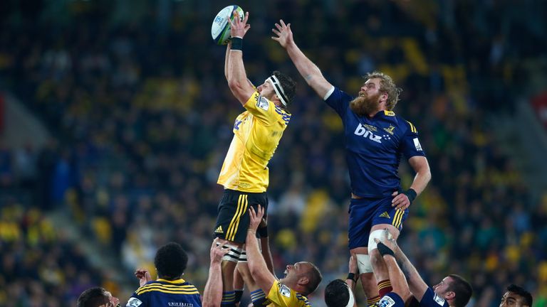 Jeremy Thrush of the Hurricanes takes the ball in the lineout ahead of Mark Reddish of the Highlanders