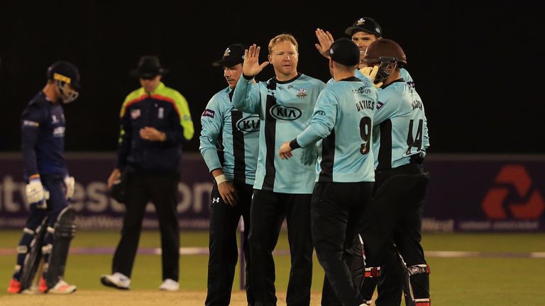 CHELMSFORD, ENGLAND - MAY 20:  Gareth Batty of Surrey celebrates the dismissal of Tom Westley of Essex during the NatWest T20 Blast match between Essex and