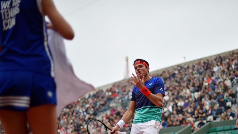 Canada's Milos Raonic reacts during his men's fourth round match against Spain's Albert Ramos at the Roland Garros 