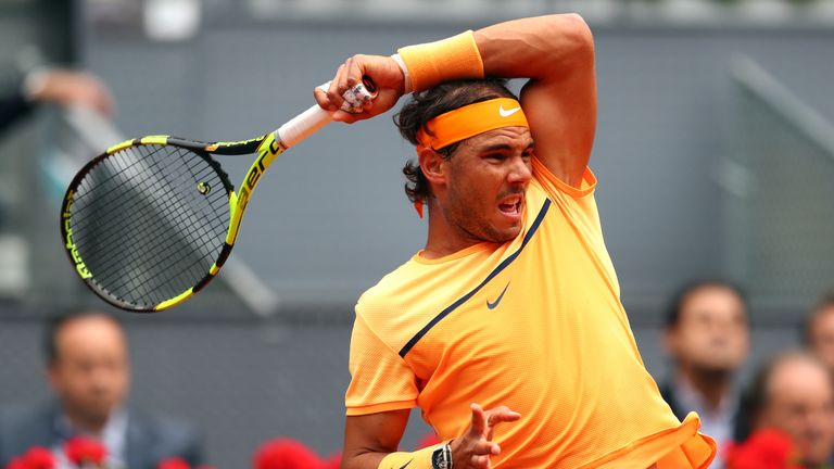 Rafael Nadal of Spain in action against Andy Murray of Great Britain in the semi-finals of the Mutua Madrid Open 