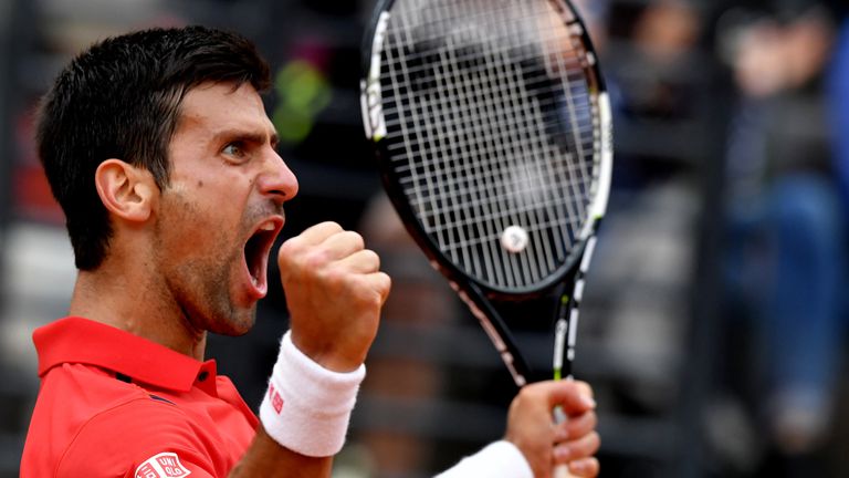 Novak Djokovic reacts against Spanish Rafa Nadal during the ATP Tennis Open tournament at the Foro Italico