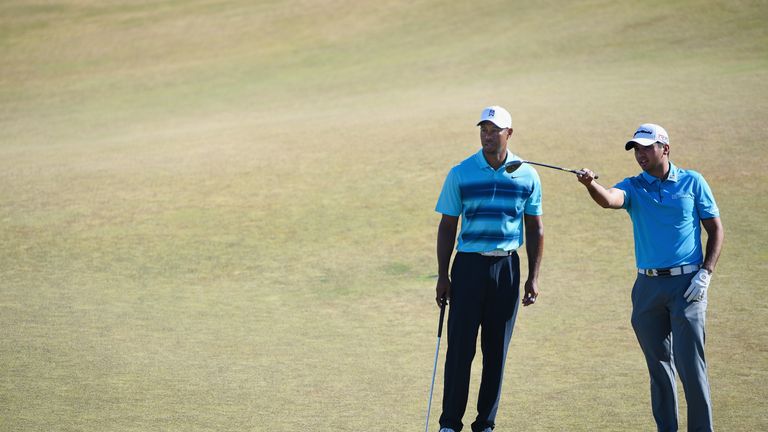 UNIVERSITY PLACE, WA - JUNE 15:  (L-R) Tiger Woods of the United States and Jason Day of Australia chat during a practice round prior to the start of the 1