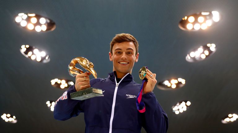 LONDON, ENGLAND - MAY 15:  Tom Daley of Great Britain poses with his LEN 'Best Diver' award and gold medal after winning the Men's 10m Platform Final on da