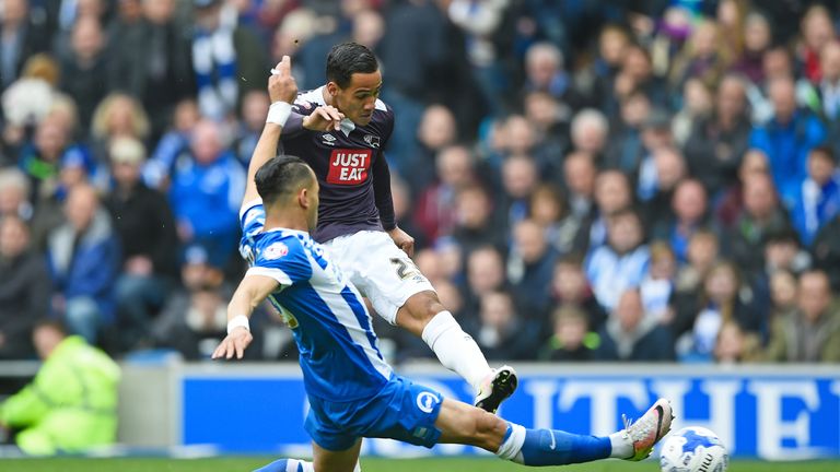 Tom Ince of Derby County shoots on goal under pressure from Liam Rosenior of Brighton and Hove Albion 
