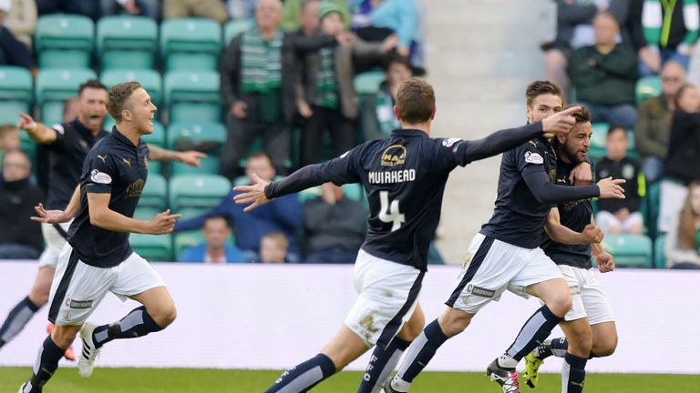 Falkirk's Tom Taiwo (right) celebrates with his team-mates as his deflected shot opens the scoring against Hibernian