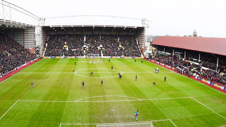 The main stand at Tynecastle (l) will be replaced