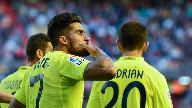 Villarreal midfielder Samuel Garcia (L) celebrates after scoring in the La Liga match v Valencia at the Mestalla