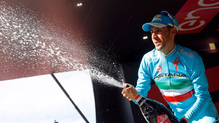 Italy's Vincenzo Nibali of team Astana celebrates on the podium after winning the 19th stage of the 99th Giro d'Italia, Tour of Italy, from Pinerolo to Ris