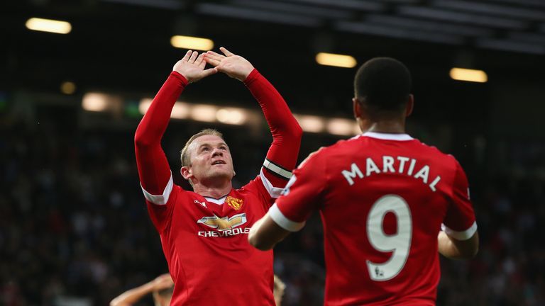 Wayne Rooney of Manchester United celebrates with Anthony Martial 