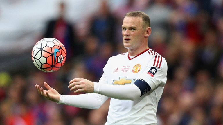 LONDON, ENGLAND - MAY 21:  Wayne Rooney of Manchester United catches the match ball during The Emirates FA Cup Final match between Manchester United and Cr