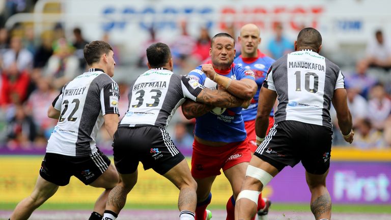 Salford's Weller Hauraki locks horns with the Widnes defence during the Magic Weekend opener