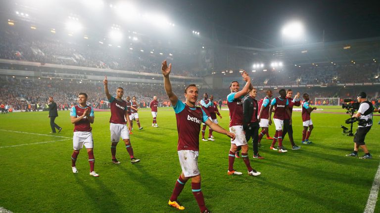 Mark Noble of West Ham United and team mates salute the crowd after victory in the Barclays Premier League match between West Ham
