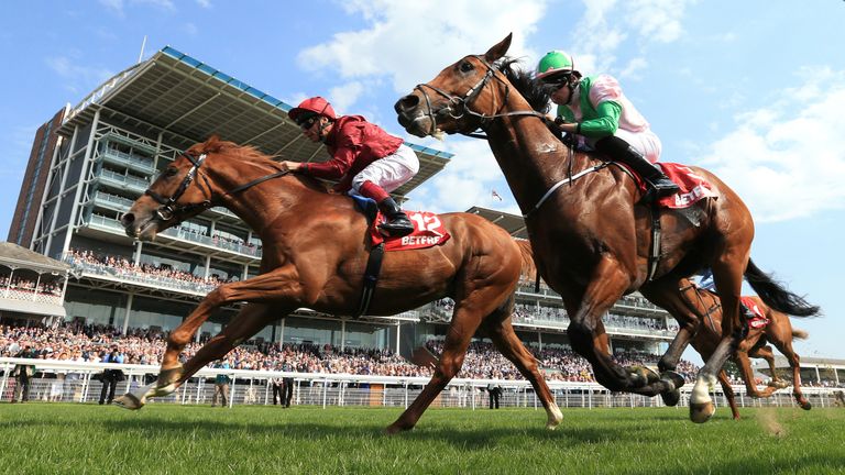 Wings of Desire (left) beats Deauville 