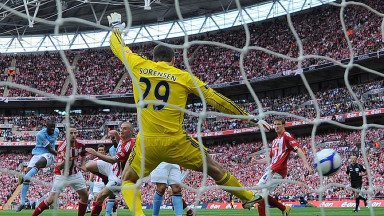 Manchester City's Yaya Toure scores a goal against Stoke during the FA Cup final football match against Stoke City in 2011