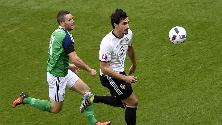 Mats Hummels (right) battles for the ball with Conor Washington at Euro 2016